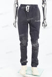 Distressed royal blue dotted embroidered sweatpants