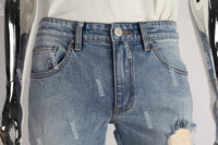 blue distressed flare bottom stacked men jeans with embroidery
