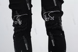 black paint spplatters distressed skinny men jeans with embroidery logo